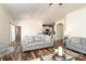 Inviting living room featuring comfortable seating, modern decor, and an open layout leading to the kitchen at 6719 Jerimoth Dr, Charlotte, NC 28215