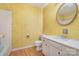 Cozy bathroom with a bath-shower, and vanity, showcasing unique wallpaper at 7106 Marlbrook Dr, Charlotte, NC 28212