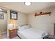 Bedroom featuring neutral walls, carpet, a window, lamp, and storage at 743 Dream Ln, Salisbury, NC 28146