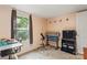 Neutral bedroom featuring a window, desk, telescope, and musical instrument equipment at 743 Dream Ln, Salisbury, NC 28146