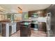 Updated kitchen includes stainless steel appliances, sleek countertops, and lots of cabinet space at 743 Dream Ln, Salisbury, NC 28146