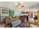 Cozy living room featuring neutral tones, plush seating, and an open layout to the kitchen at 743 Dream Ln, Salisbury, NC 28146