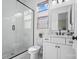 Modern bathroom with glass-enclosed shower, sleek vanity, and stylish fixtures at 1005 Grand Oak Dr, Waxhaw, NC 28173