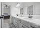 Bathroom showcasing double sinks, vanity with a white countertop and decorative patterned floor at 1005 Grand Oak Dr, Waxhaw, NC 28173