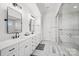 A luxurious bathroom features double vanity, soaking tub, and walk-in shower at 1005 Grand Oak Dr, Waxhaw, NC 28173