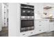 This modern kitchen features stainless steel appliances and double oven at 1005 Grand Oak Dr, Waxhaw, NC 28173