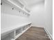 Functional mudroom with built-in bench, storage cubbies, and convenient hooks at 1005 Grand Oak Dr, Waxhaw, NC 28173