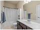 Traditional bathroom with shower, vanity, mirror, and built-in storage at 1011 Potomac Rd, Indian Trail, NC 28079