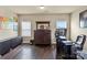 This bedroom features a large dresser, hardwood floors, and natural light from two windows at 1011 Potomac Rd, Indian Trail, NC 28079