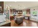 Spacious eat-in kitchen featuring a center island, stainless steel appliances, and plenty of countertop space at 1011 Potomac Rd, Indian Trail, NC 28079