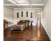 Inviting living room featuring hardwood floors, coffered ceilings, and comfortable seating at 1011 Potomac Rd, Indian Trail, NC 28079