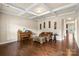 Cozy living area with a coffered ceiling, hardwood floors, and comfortable seating arrangement at 1011 Potomac Rd, Indian Trail, NC 28079