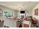 Comfortable living room with a fireplace, hardwood floors and natural light at 1011 Potomac Rd, Indian Trail, NC 28079
