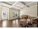Inviting living room featuring hardwood floors, coffered ceilings, and natural light at 1011 Potomac Rd, Indian Trail, NC 28079