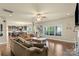 Open-concept living room featuring a large window, wood floors, and neutral tones at 1011 Potomac Rd, Indian Trail, NC 28079