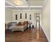 Spacious living room boasting hardwood floors, stylish decor, and a bright, open feel at 1011 Potomac Rd, Indian Trail, NC 28079