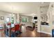 View of the combined living and dining area featuring an open-concept design and ample natural light at 1011 Potomac Rd, Indian Trail, NC 28079
