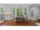 Bright dining room with large windows providing great views of the backyard at 1012 Sudbury Ln, Matthews, NC 28104