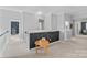Loft area showcasing chalkboard wall, neutral carpet, and open space with natural light at 1012 Sudbury Ln, Matthews, NC 28104