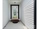 Entryway with decorative glass front door and covered porch, providing a welcoming entrance at 103 Pine Meadows Cir, Hickory, NC 28601