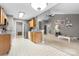 Open-concept kitchen featuring stainless steel appliances and an adjacent living room at 103 Pine Meadows Cir, Hickory, NC 28601
