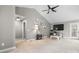 Bright living room with vaulted ceilings, ceiling fan, and cozy decor for relaxation at 103 Pine Meadows Cir, Hickory, NC 28601