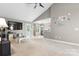 Spacious living room features vaulted ceilings, modern decor, and access to outdoor spaces at 103 Pine Meadows Cir, Hickory, NC 28601