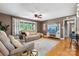 Bright and airy living room featuring hardwood floors, neutral tones, and a large window at 1110 16Th Avenue Nw Pl, Hickory, NC 28601