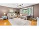 Comfortable living room featuring hardwood floors, neutral decor, and ample natural light at 1110 16Th Avenue Nw Pl, Hickory, NC 28601