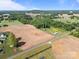 Expansive land featuring house, fields, nearby woodlands, and a clear blue sky at 1160 Redmon Rd, Cleveland, NC 27013