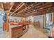 Unfinished basement with block walls, exposed ceiling, and concrete floor at 1160 Redmon Rd, Cleveland, NC 27013