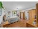 Spacious bedroom with wood floors, natural light, and neutral décor at 1160 Redmon Rd, Cleveland, NC 27013