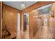 Inviting hallway with classic wood paneling and a functional layout at 1160 Redmon Rd, Cleveland, NC 27013