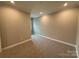 Spacious bedroom with neutral paint, plush carpet and ample electrical outlets at 12032 Lavinia Ln, Charlotte, NC 28277