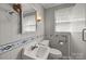 Bathroom features tile accents and a vintage sink at 1233 E Cannon Ave, Albemarle, NC 28001