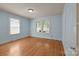 Charming bedroom featuring hardwood floors, fresh paint, and natural light at 1233 E Cannon Ave, Albemarle, NC 28001
