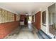 Spacious carport with brick walls and ample parking, providing convenient access to the home at 1233 E Cannon Ave, Albemarle, NC 28001