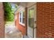 Brick house featuring an inviting entryway with classic details and a well-maintained exterior at 1233 E Cannon Ave, Albemarle, NC 28001