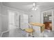 Functional kitchen featuring white appliances, a center island, and access to other rooms at 1233 E Cannon Ave, Albemarle, NC 28001