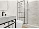 Modern bathroom featuring a glass-enclosed shower and marble countertop vanity at 124 Clipper Ln, Mooresville, NC 28117