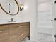 Elegant bathroom vanity featuring a modern faucet and sleek design at 124 Clipper Ln, Mooresville, NC 28117
