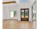 Inviting entryway with hardwood floors, soaring ceilings, and a beautiful view of the surrounding landscape at 124 Clipper Ln, Mooresville, NC 28117