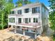 Stunning two-story home boasts multiple balconies and a spacious outdoor area at 124 Clipper Ln, Mooresville, NC 28117