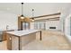 Modern kitchen with island, stainless steel appliances, and an open floor plan at 124 Clipper Ln, Mooresville, NC 28117