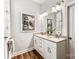 Well-lit bathroom featuring a double vanity, modern fixtures, and stylish decor at 1260 Thomas Knapp Pkwy, Fort Mill, SC 29715