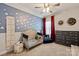A cozy, well-lit bedroom with a playful Toy Story-themed decor and comfortable furnishings at 1260 Thomas Knapp Pkwy, Fort Mill, SC 29715