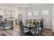 The formal dining room has space for entertaining with a chandelier and kitchen access at 1260 Thomas Knapp Pkwy, Fort Mill, SC 29715