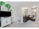 Neutral hallway with mounted TV, decorative tree decal, and soft carpet at 1260 Thomas Knapp Pkwy, Fort Mill, SC 29715