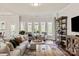 Cozy living area with large windows, comfortable seating, and a view of the outdoors at 1260 Thomas Knapp Pkwy, Fort Mill, SC 29715