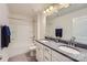 Bathroom featuring a double vanity, a large mirror, granite countertops, and a shower-tub combo at 128 Championship Dr, Mooresville, NC 28115